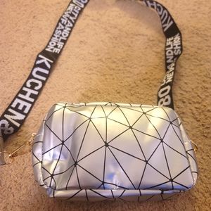 Geometric pouch with strap